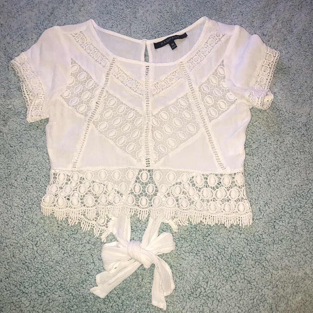 Cropped , see through top .